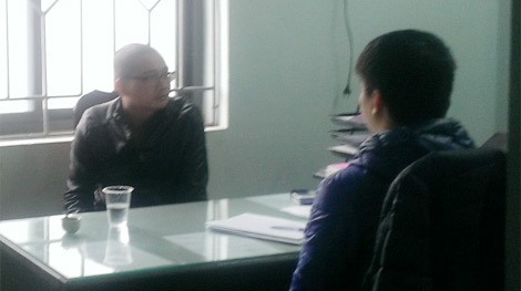 Cao Xuân Quát tại trụ sở công an quận Bắc Từ Liêm. Ảnh: CAND.