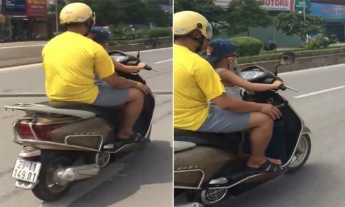 Clip be trai 5 tuoi dieu khien xe may tren duong hinh anh