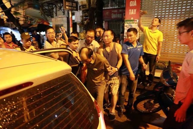 Người đàn ông cố thủ ở Hà Nội ảnh 1 Nguoi dan ong co thu o Ha Noi anh 1