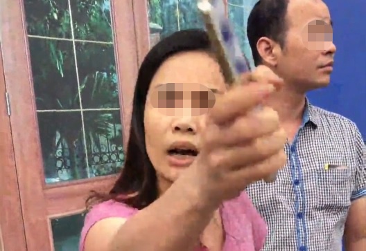 Cong an Ha Noi xac minh nguoi phu nu lon tieng quat CSGT hinh anh