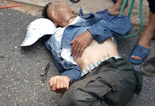 Cong an bac tin don nguoi dan ong bi danh guc vi bat coc tre hinh anh