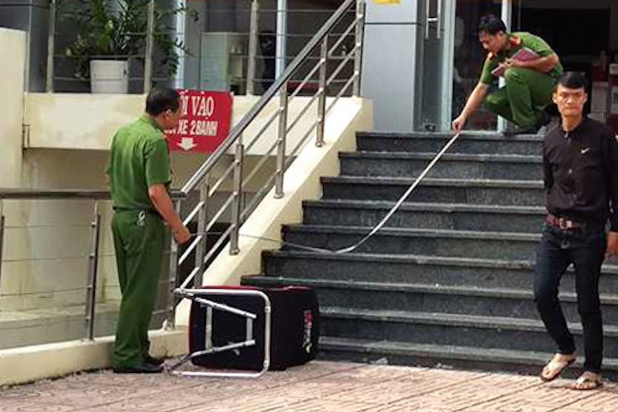 Canh sat truy bat ke giat 200 trieu cua co gai trong ngan hang hinh anh