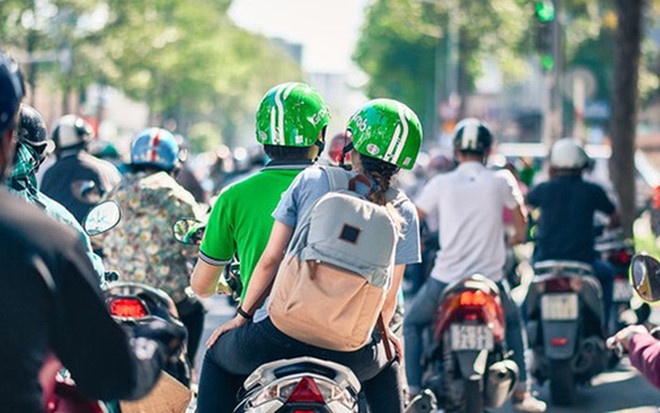 Tai xe GrabBike quay roi tinh duc be gai 9 tuoi bi phat hanh chinh hinh anh