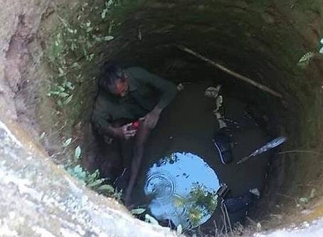 Nguoi dan ong bi mac ket suot 5 gio duoi gieng hoang hinh anh