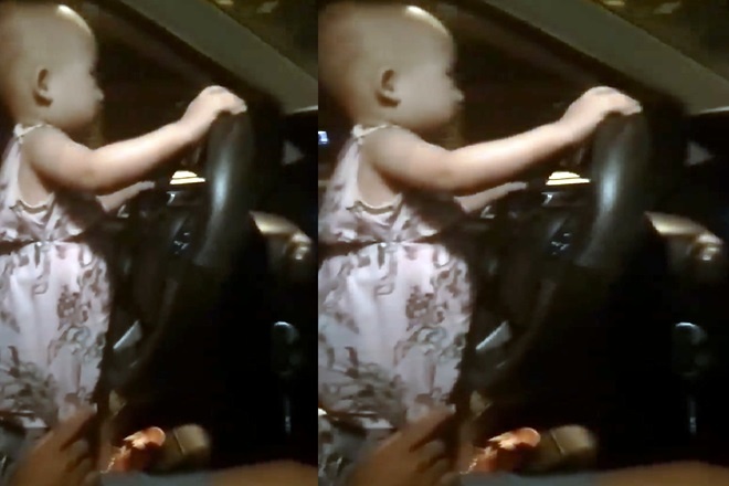 Be gai cam vo lang dieu khien oto di trong dem hinh anh