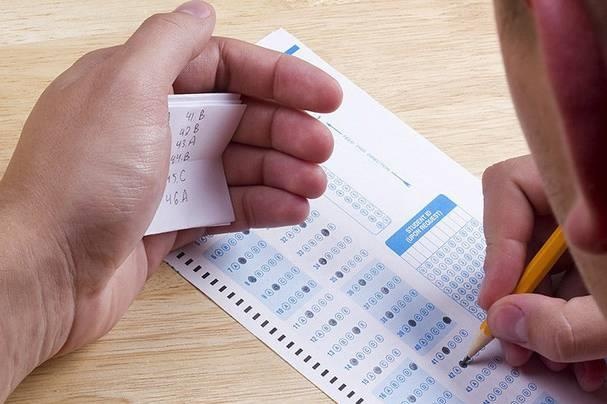 5 bi can vu nang diem thi o Ha Giang bi truy to toi gi? hinh anh