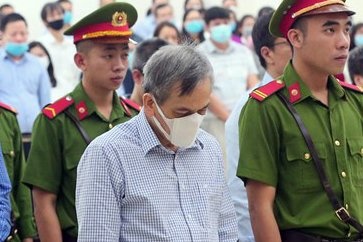 Cuu pho tong giam doc BIDV linh 8 nam tu hinh anh