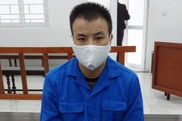 Nguoi dan ong nhan 2 an tu hinh hinh anh