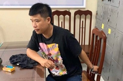 Danh tai xe taxi, nguoi dan ong bi bat sau hon mot nam lan tron hinh anh