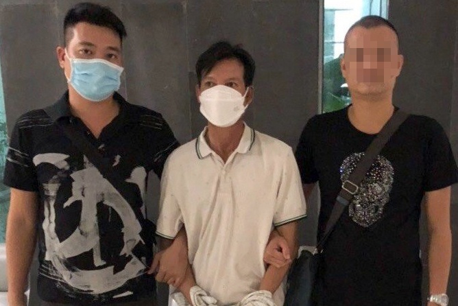 Manh moi bat nghi pham cuop tai san sau 28 nam tron truy na hinh anh