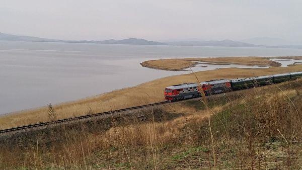 Ong Kim Jong Un dung o ga Hasan, Nga hinh anh