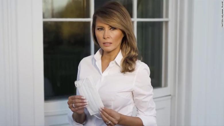 Melania Trump khuyen deo khau trang anh 1