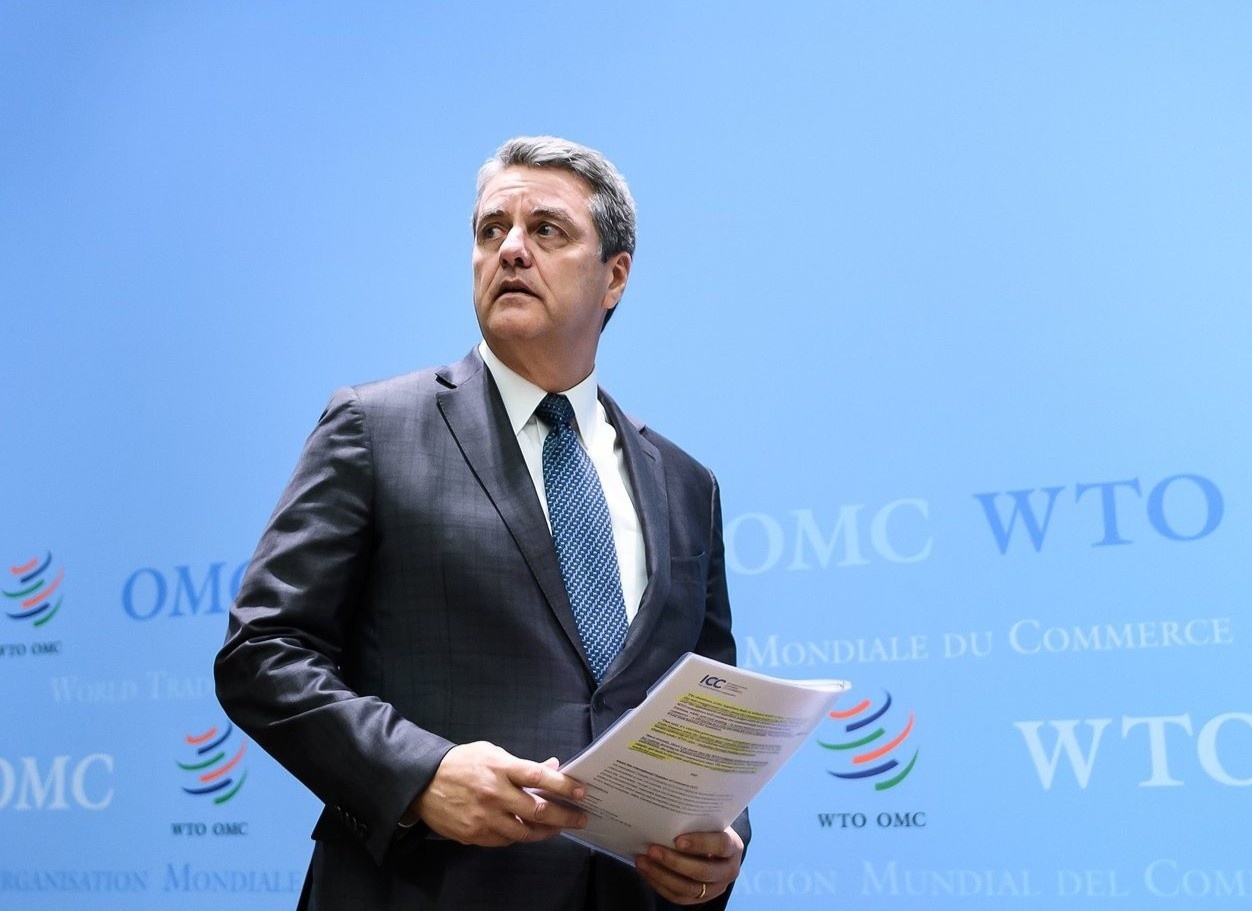 Tong giam doc WTO bat ngo tu chuc som giua dai dich hinh anh