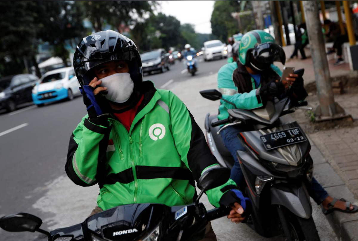 Dai dich Covid-19 bop nghet tai xe Grab va Gojek o Dong Nam A hinh anh