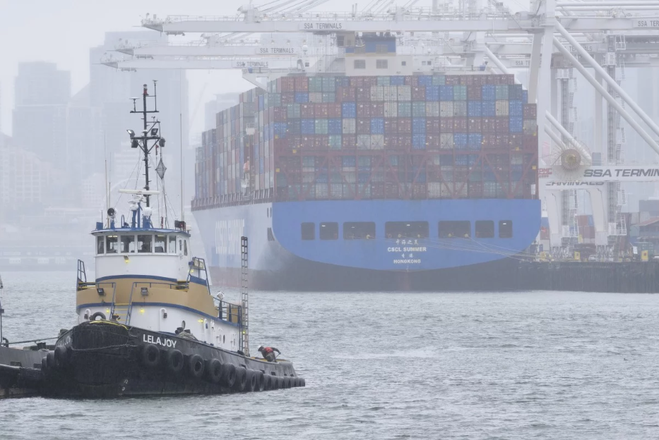 Doanh nghiep chiu tran giua cang thang My - Trung hinh anh