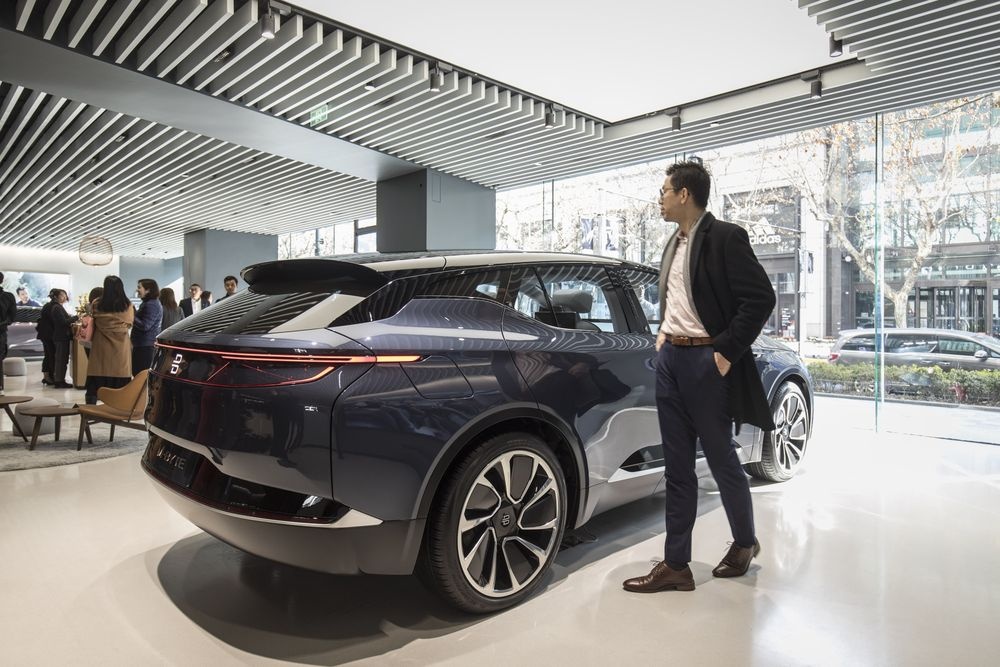 ty phu trung quoc xe hoi dien anh 1