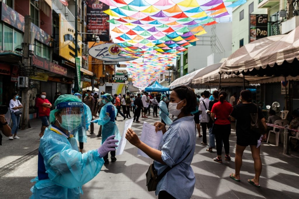 Virus Covid-19 chung moi de doa kinh te anh 1