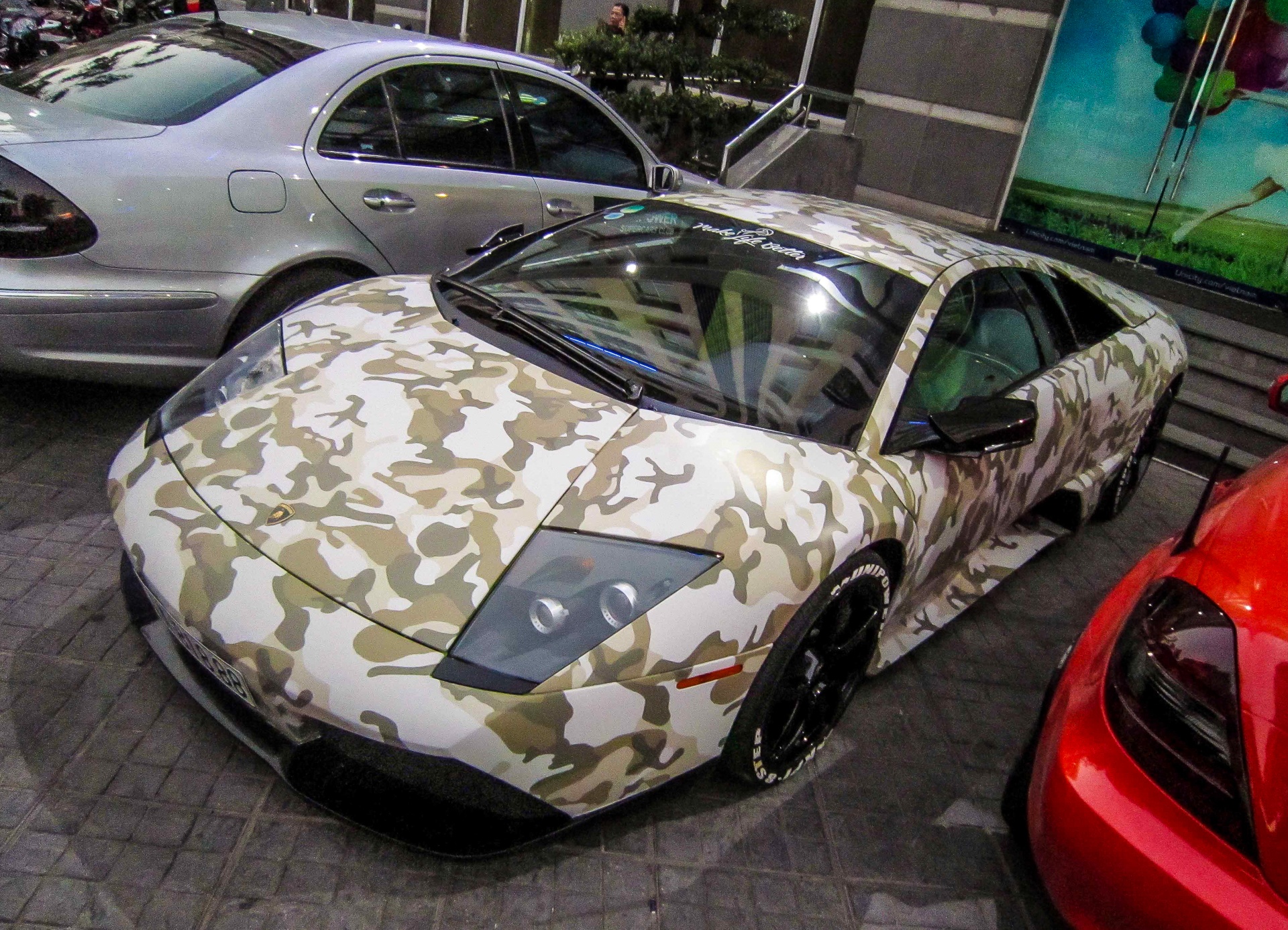 Lamborghini Murcielago LP640 mau camo la mat o Sai Gon hinh anh