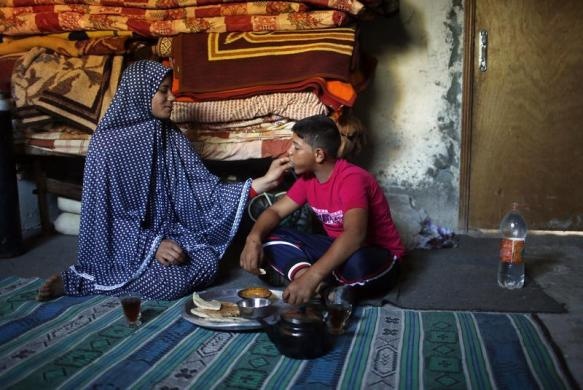 Cuoc song cua cap vo chong tre con tai Palestine hinh anh