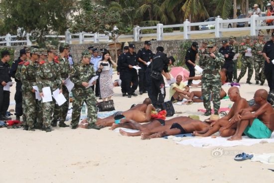 Canh sat Trung Quoc truy bat nguoi tam tien hinh anh