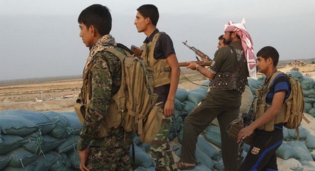 IS lai hanh quyet 50 nguoi, bat coc 65 nguoi hinh anh