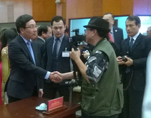 Bo truong Ngoai giao Pham Binh Minh chuc Tet kieu bao hinh anh