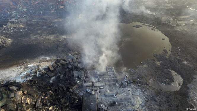 Chay no o Thien Tan, so nguoi chet len hon 100 hinh anh