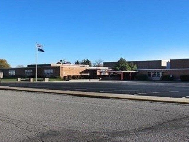 Nhan vat bi an doa danh bom truong hoc My vao ngay 11/9 hinh anh