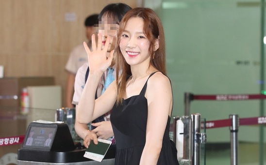 Xuat hien cung dan sao SM, Taeyeon (SNSD) bi che mac nham vay bau hinh anh