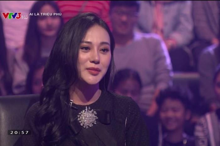 Phuong Oanh vuot qua cau hoi so 9 nho su tro giup hinh anh