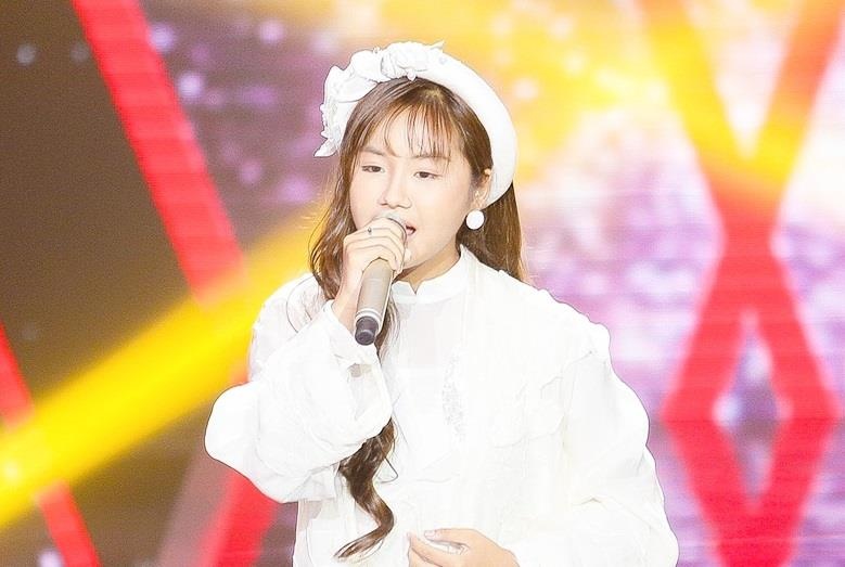 Thi sinh 13 tuoi hat 'Duyen phan' o Giong hat Viet nhi hinh anh