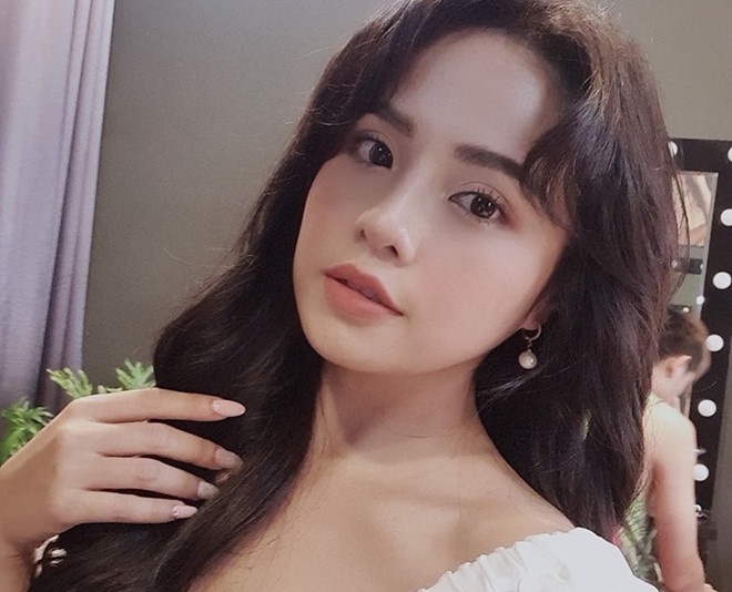 Thai Trinh hat ca khuc cua Erik, bay to tam trang sau khi that tinh hinh anh