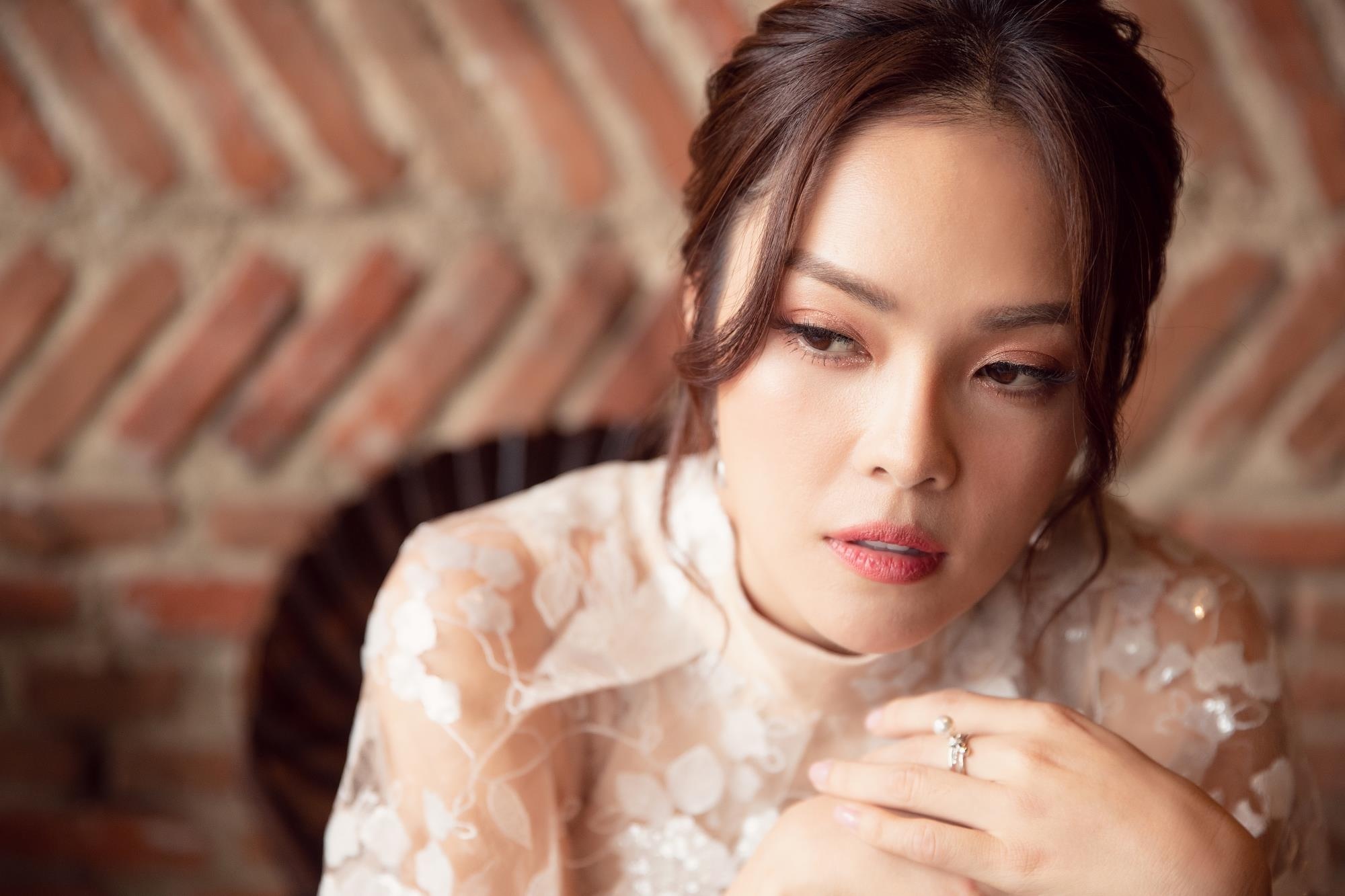 Duong Cam Lynh: 'Toi da mua duoc nha sau mot nam ly hon chong' hinh anh