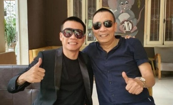 Dang sau buc anh chung cua rapper Wowy va nha bao Lai Van Sam hinh anh