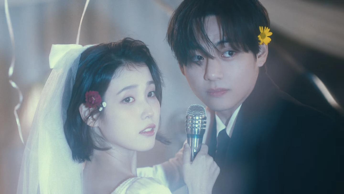 Chuyen tinh gay sot cua IU va V trong MV moi hinh anh