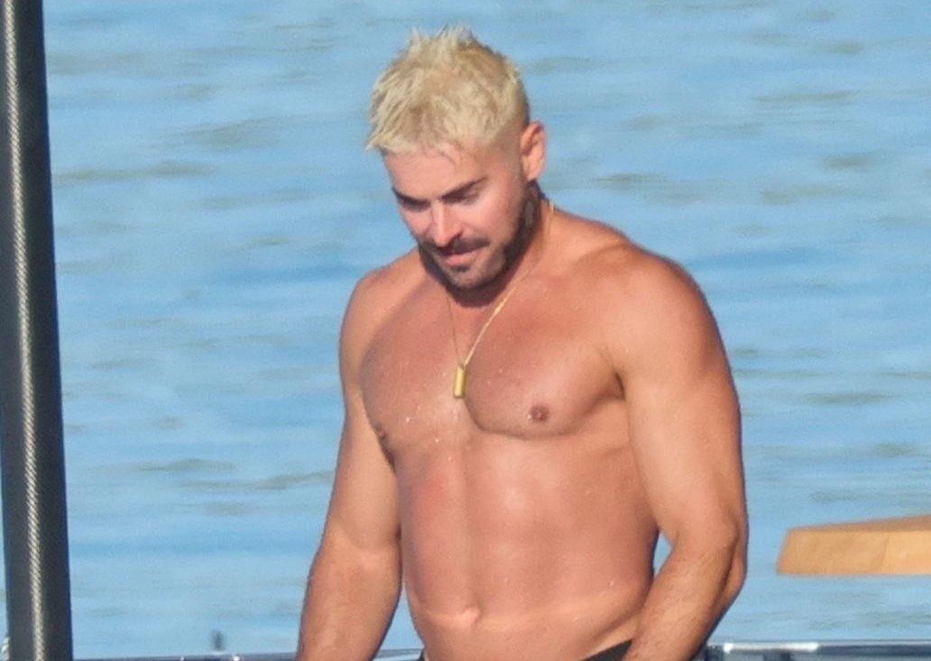 Zac Efron gay ban tan voi than hinh vam vo hinh anh