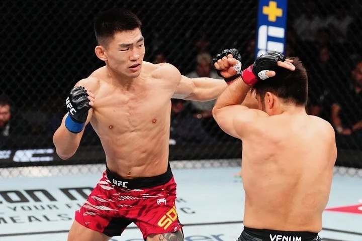 Ty thi voi cao thu kungfu Trung Quoc, cuu vo dich Olympic suyt mu mat hinh anh