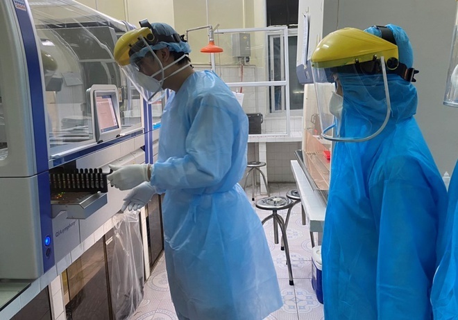 may xet nghiem Covid-19 anh 1