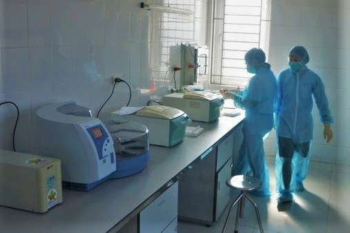 may xet nghiem Covid-19 anh 1