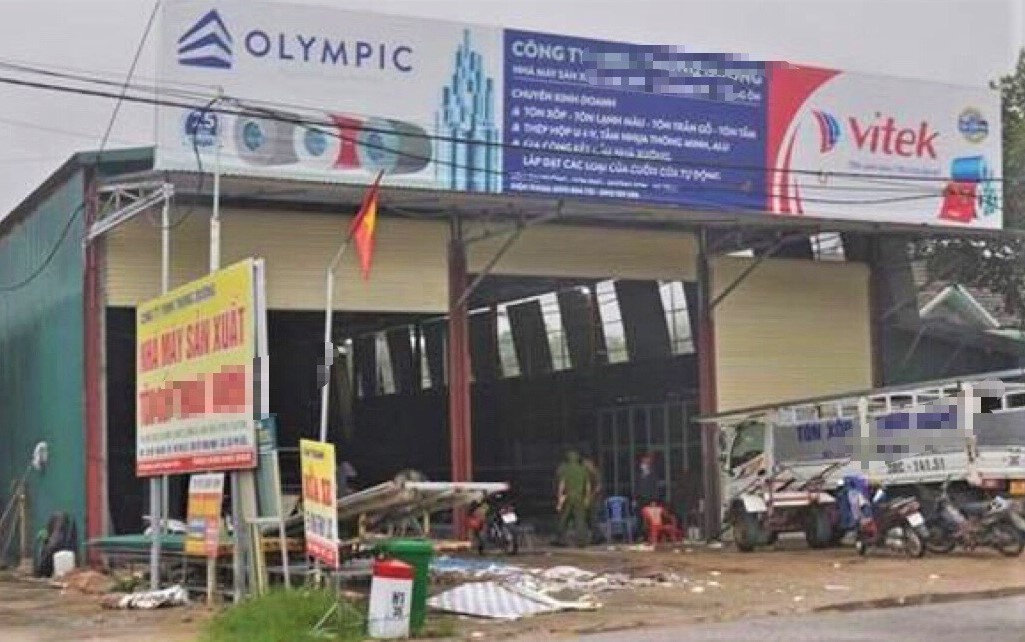 Giam doc cong ty bi cuon vao may can ton hinh anh