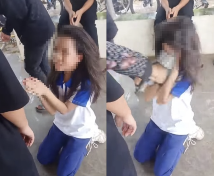 Nu sinh o Ha Noi chap tay, quy goi van xin khi bi danh hoi dong hinh anh