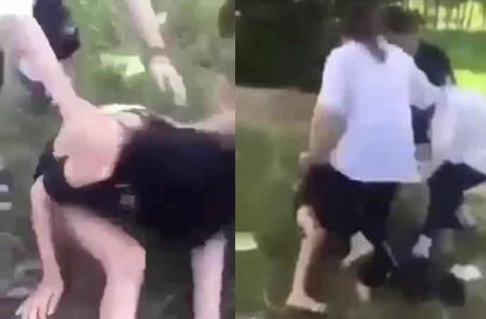 Nu sinh lop 8 bi danh hoi dong, lot quan ao hinh anh