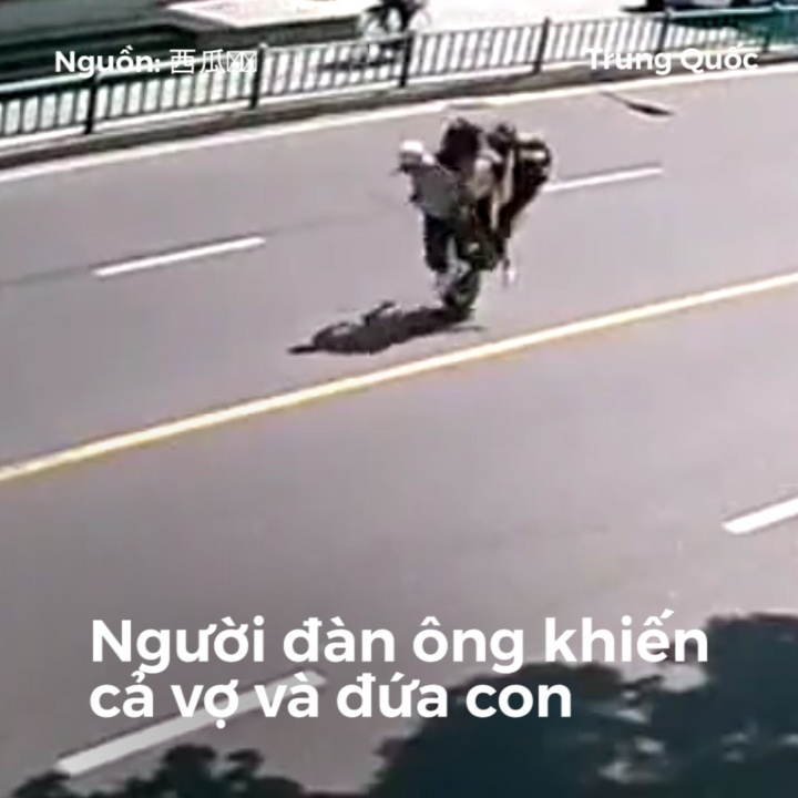 Ong chong Trung Quoc thang xe gap khien vo con lon nhao giua duong hinh anh