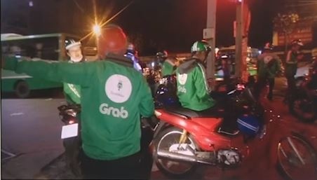 Grab 'gia' long hanh ben xe mien Dong va san bay Tan Son Nhat hinh anh