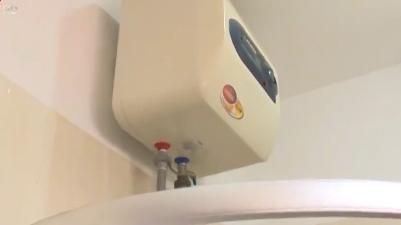 Huong dan su dung binh nong lanh an toan trong gia dinh hinh anh