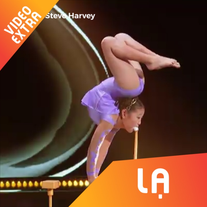 Man uon deo tren nhung thanh go cua co be nguoi Trung Quoc hinh anh