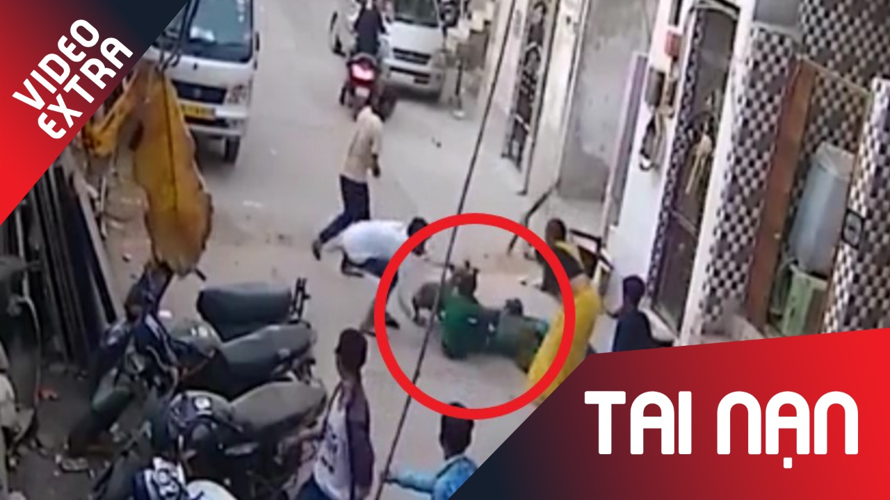 Cho 'dien' ruot duoi nguoi dan, lam nao loan duong pho o An Do hinh anh