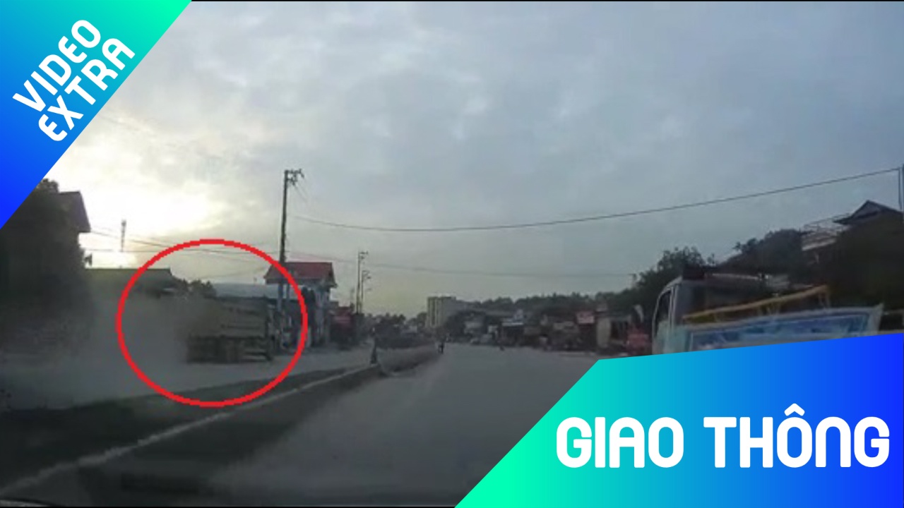 Xe tai co tinh quay dau roi chay nguoc chieu tren Quoc lo 18 hinh anh