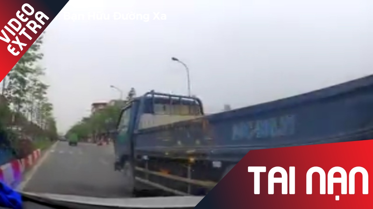 Xe tai doi lan dot ngot, suyt dam oto hinh anh