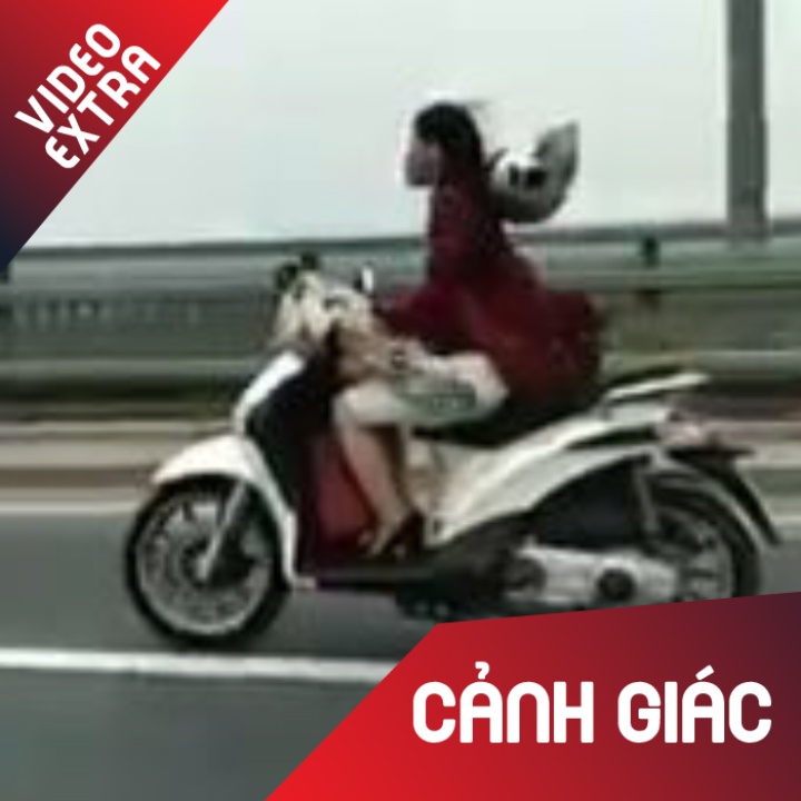 Co gai lat ngua mu bao hiem, chay bang bang tren duong hinh anh